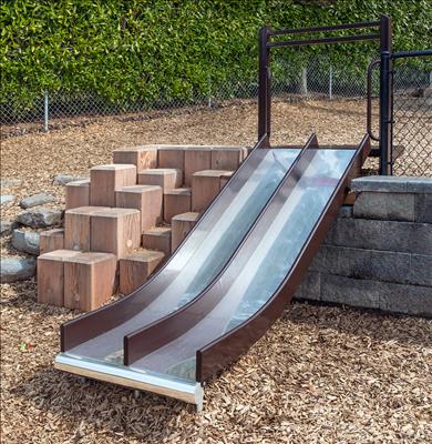 1643-42-EMB Wide Embankment Chute with Center Rail, shown with TimberForm Stepping Column access.